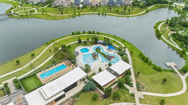 birds eye view of property with a residential view and a water view