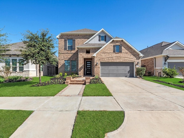 traditional-style house with driveway, brick siding, a garage, and a front yard