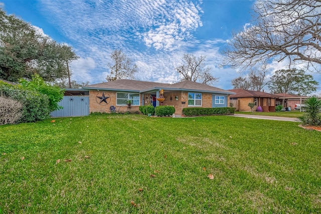 single story home with a front lawn