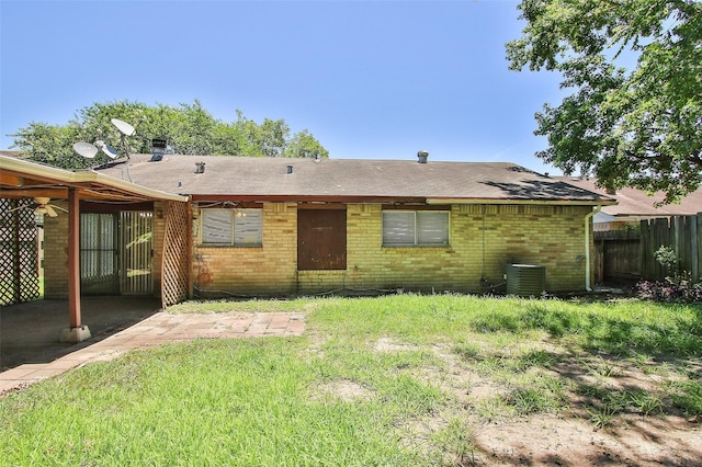 back of property with central air condition unit