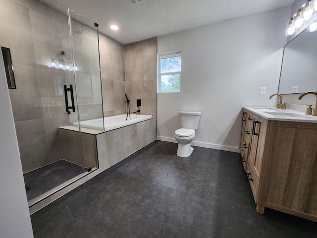 full bathroom featuring vanity, independent shower and bath, a textured ceiling, and toilet