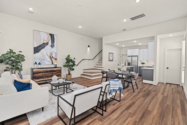 living room featuring dark hardwood / wood-style floors