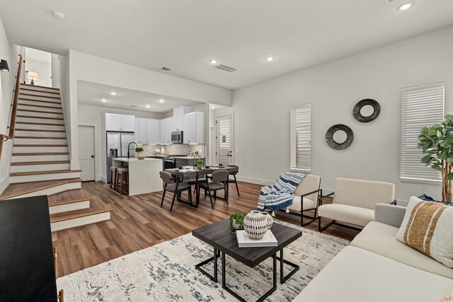 living room with wood-type flooring