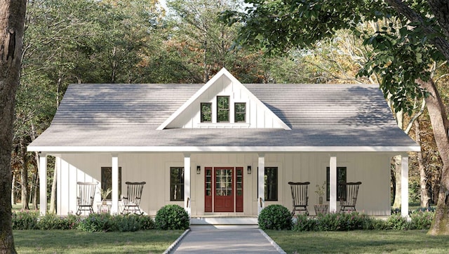 view of front of house featuring a porch and a front yard