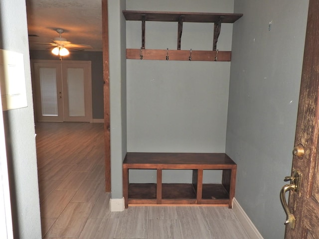 mudroom with french doors and ceiling fan