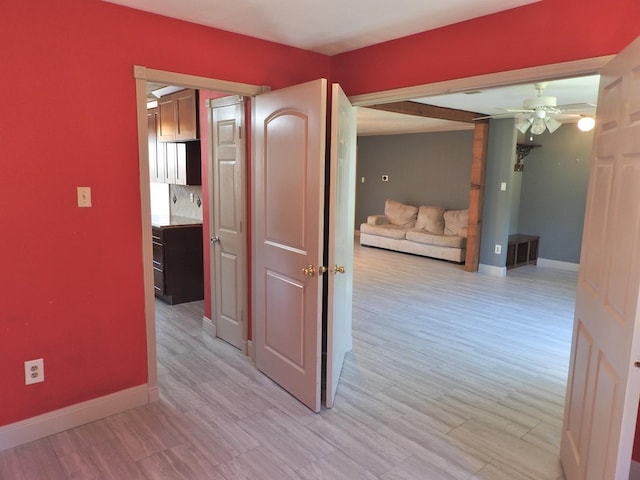 corridor featuring light hardwood / wood-style flooring