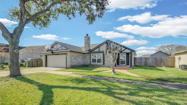 view of front facade featuring a garage and a front lawn