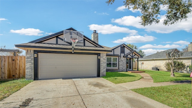 view of front of home with a front lawn and a garage