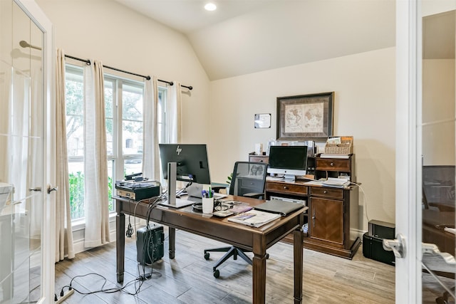 office area featuring french doors and vaulted ceiling