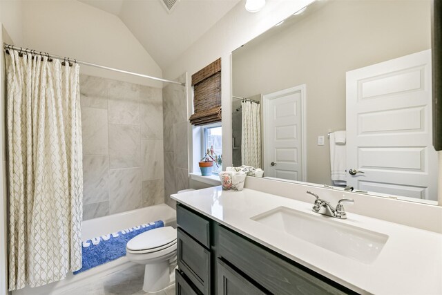 full bathroom featuring shower / tub combo, vanity, lofted ceiling, and toilet