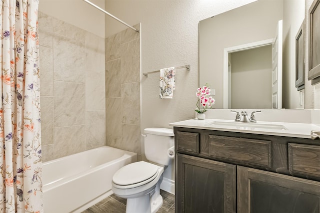 full bathroom with vanity, toilet, and shower / bath combo with shower curtain