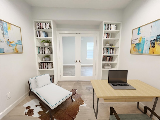 office space featuring french doors and built in shelves