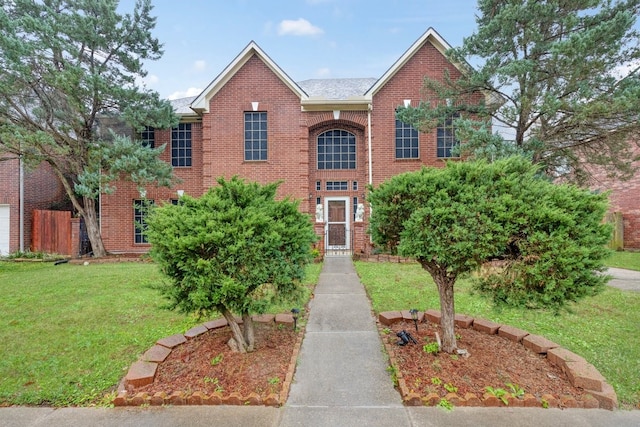 front facade with a front lawn