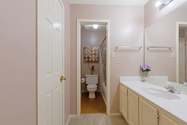 full bathroom featuring vanity, toilet, and shower / bathtub combination with curtain