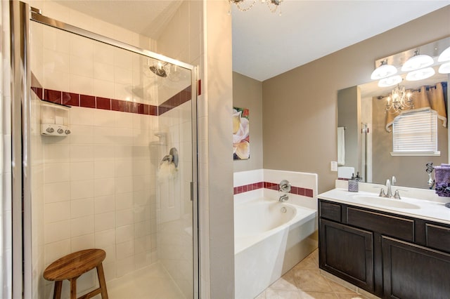 bathroom with tile patterned flooring, vanity, a chandelier, and plus walk in shower