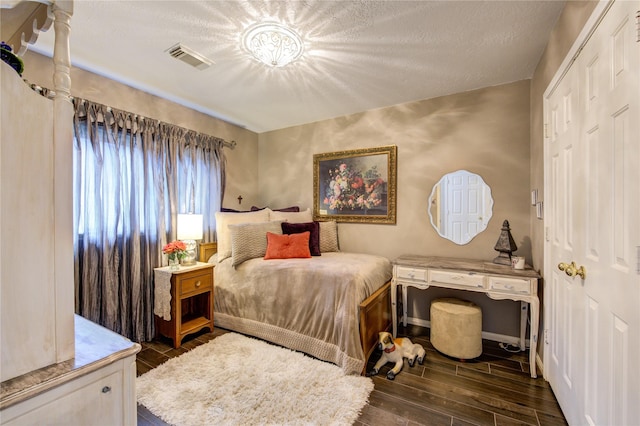 bedroom with a textured ceiling