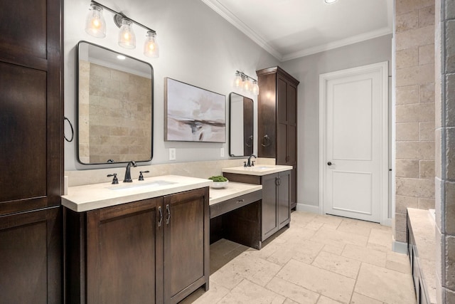 bathroom featuring vanity and ornamental molding