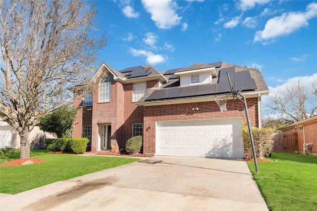 view of front facade with solar panels and a front yard