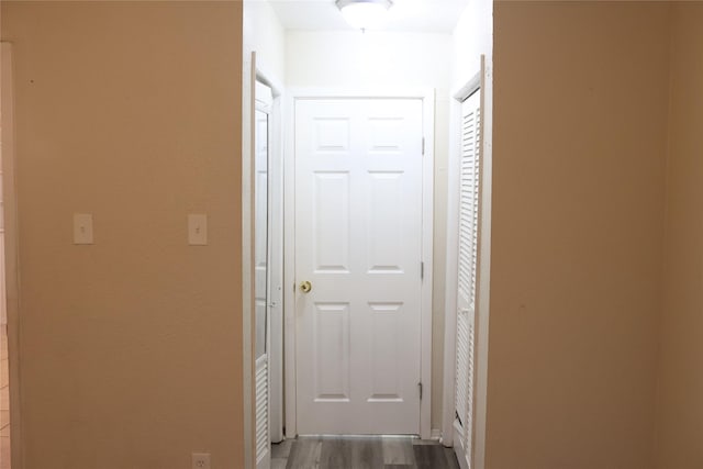 corridor featuring light hardwood / wood-style floors