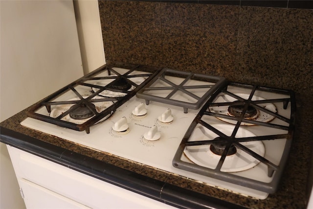 details featuring white gas stovetop