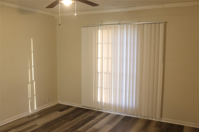 unfurnished room featuring crown molding, ceiling fan, and dark wood-type flooring