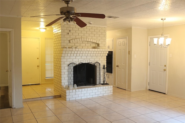 unfurnished living room featuring light tile patterned floors, ceiling fan with notable chandelier, a brick fireplace, and ornamental molding