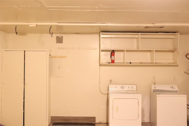 laundry room featuring washing machine and dryer