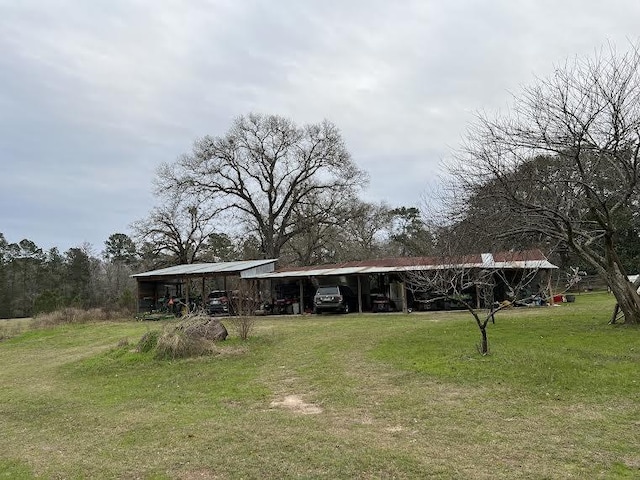 view of yard with a carport