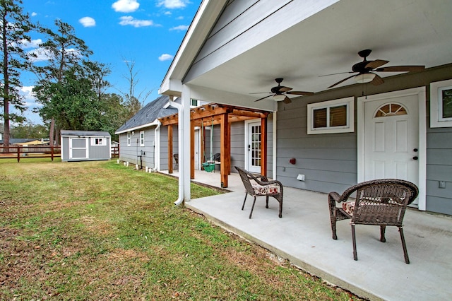 exterior space featuring a storage unit, ceiling fan, and a patio area