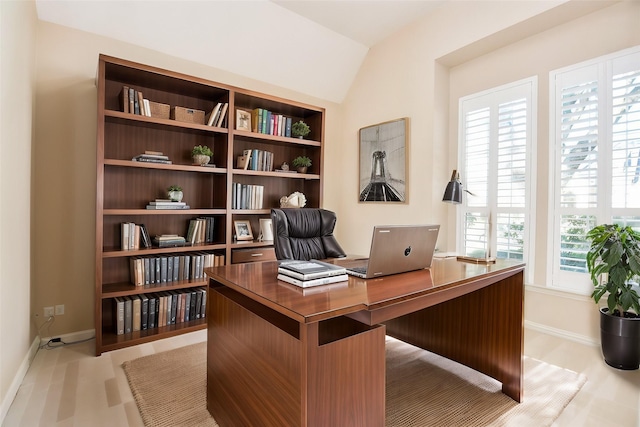 office area featuring a wealth of natural light and vaulted ceiling