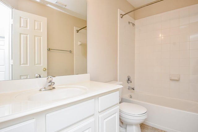 full bathroom featuring vanity, toilet, and tiled shower / bath