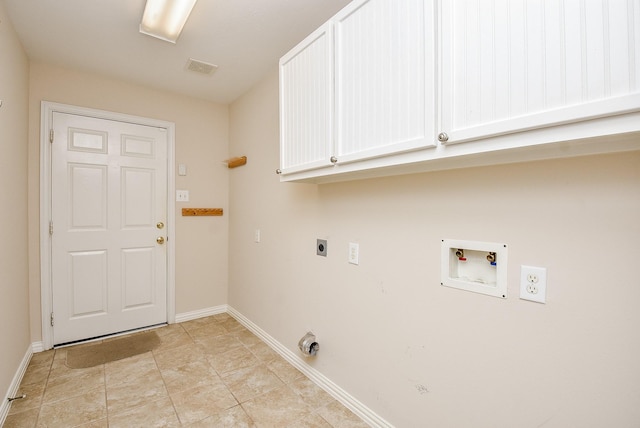 clothes washing area featuring electric dryer hookup, cabinets, and hookup for a washing machine