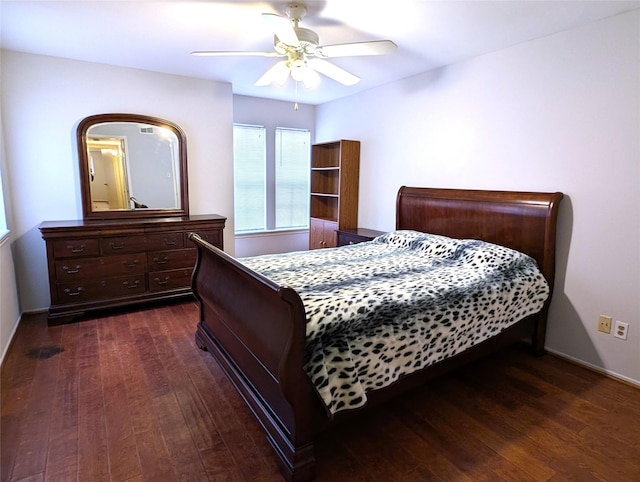 bedroom with ceiling fan and dark wood-type flooring