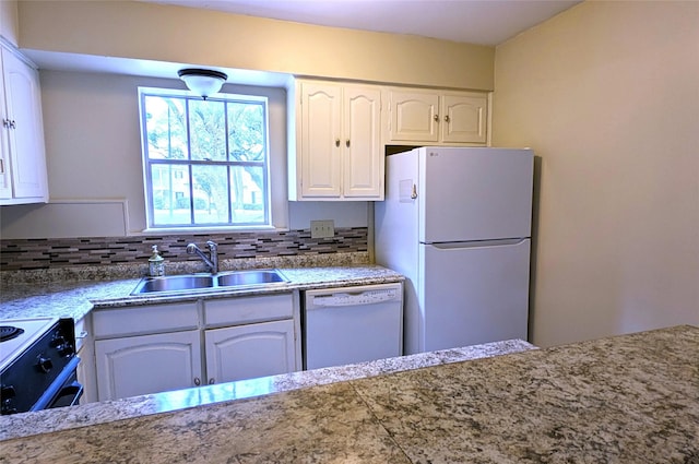 kitchen with white cabinets, white appliances, backsplash, and sink