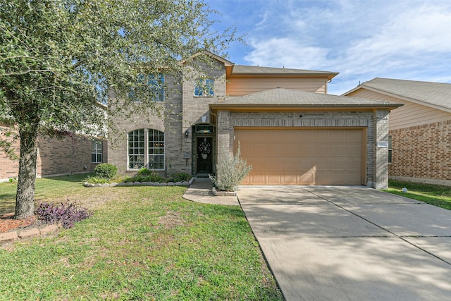 view of front property featuring a garage and a front yard