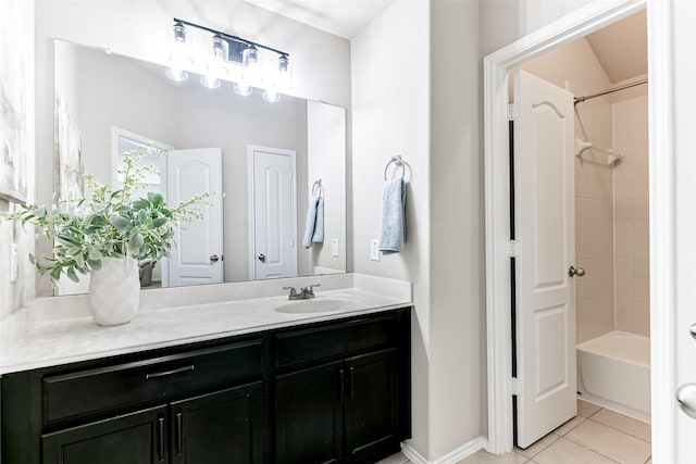 bathroom with vanity, tile patterned floors, and tub / shower combination