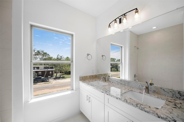 745 20th St, Hempstead, TX 77445 - bathroom featuring tile patterned flooring and vanity