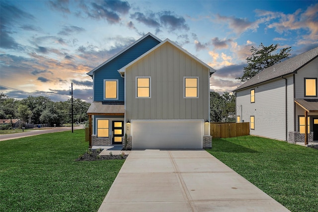 745 20th St, Hempstead, TX 77445 - view of front facade featuring a garage and a yard