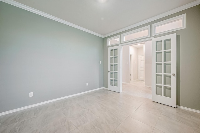 empty room featuring light tile patterned floors, crown molding, and french doors