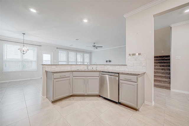 kitchen featuring sink, stainless steel dishwasher, ceiling fan with notable chandelier, and ornamental molding