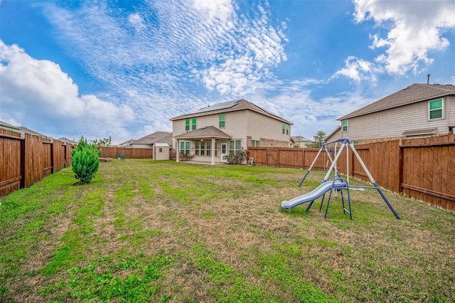 view of yard with a playground