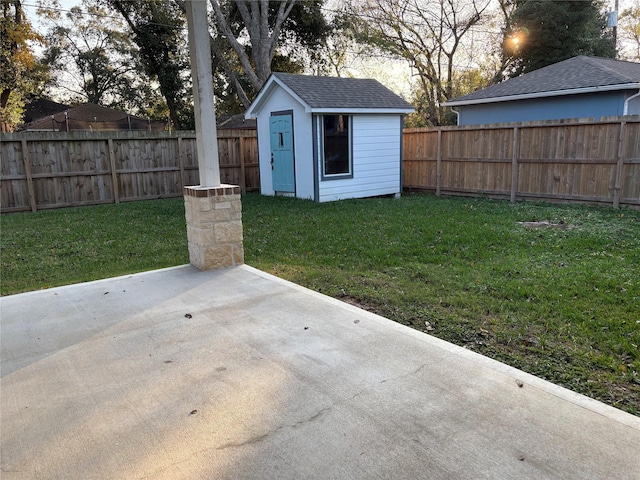 view of outdoor structure featuring a lawn