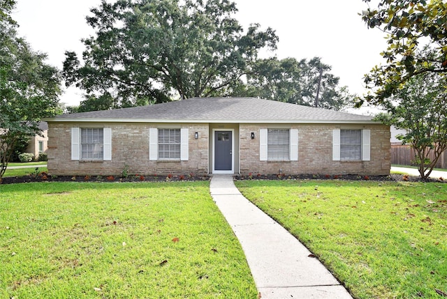 ranch-style house with a front yard