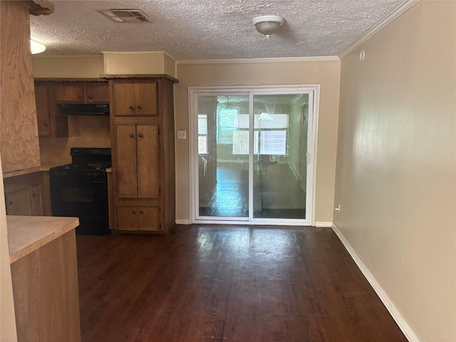 interior space featuring black stove, a textured ceiling, extractor fan, dark wood-type flooring, and crown molding