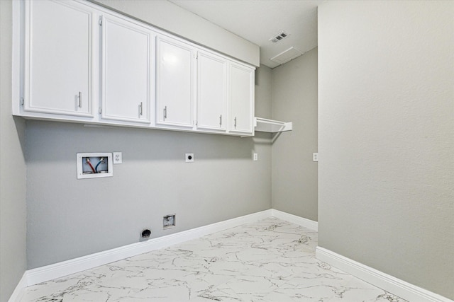 laundry room with electric dryer hookup, cabinets, and washer hookup