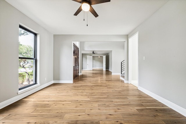 hall with light hardwood / wood-style floors