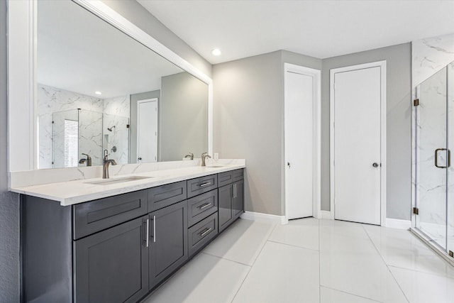 bathroom featuring tile patterned flooring, vanity, and an enclosed shower