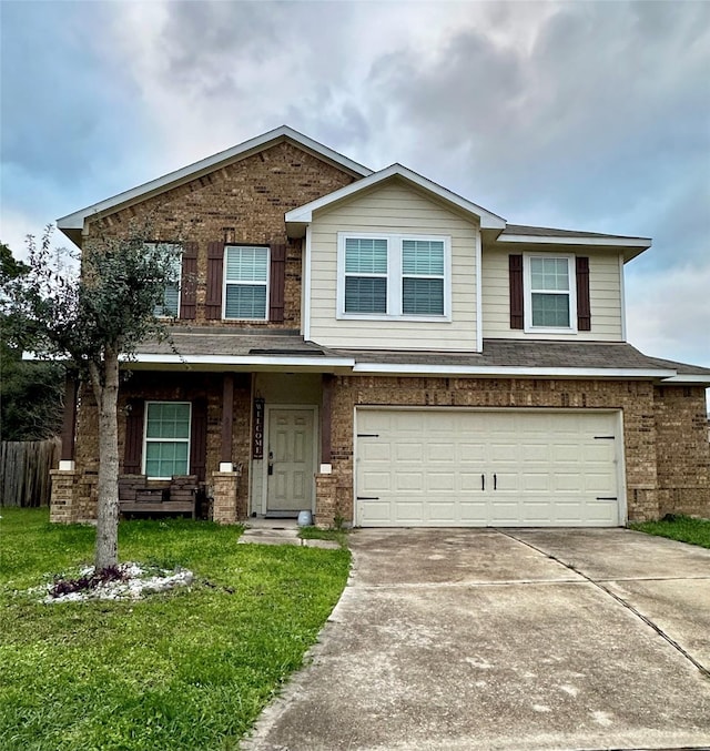 view of front facade with a front yard and a garage