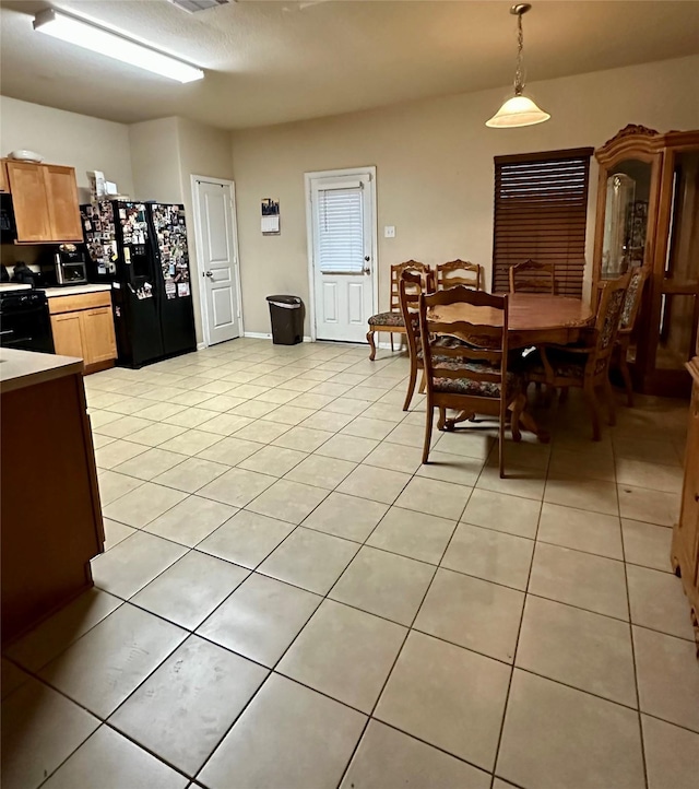 view of tiled dining space