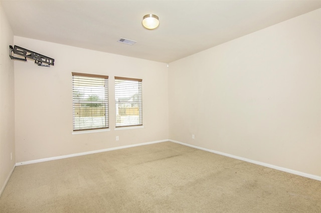 empty room featuring carpet flooring